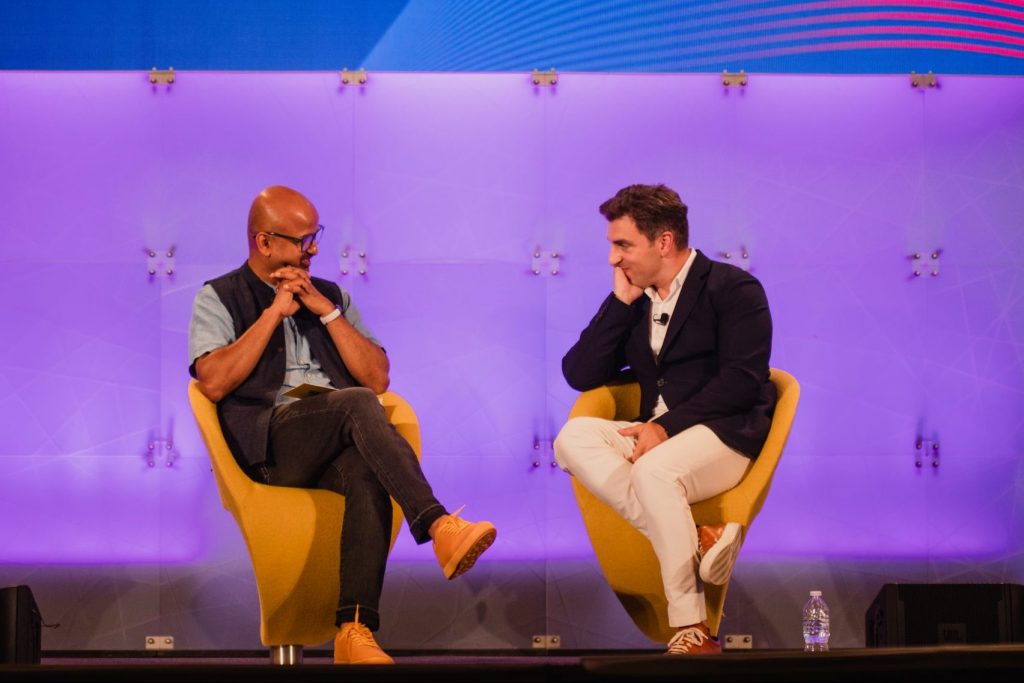 Airbnb CEO Brian Chesky speaking with Skift Founder Rafat Ali