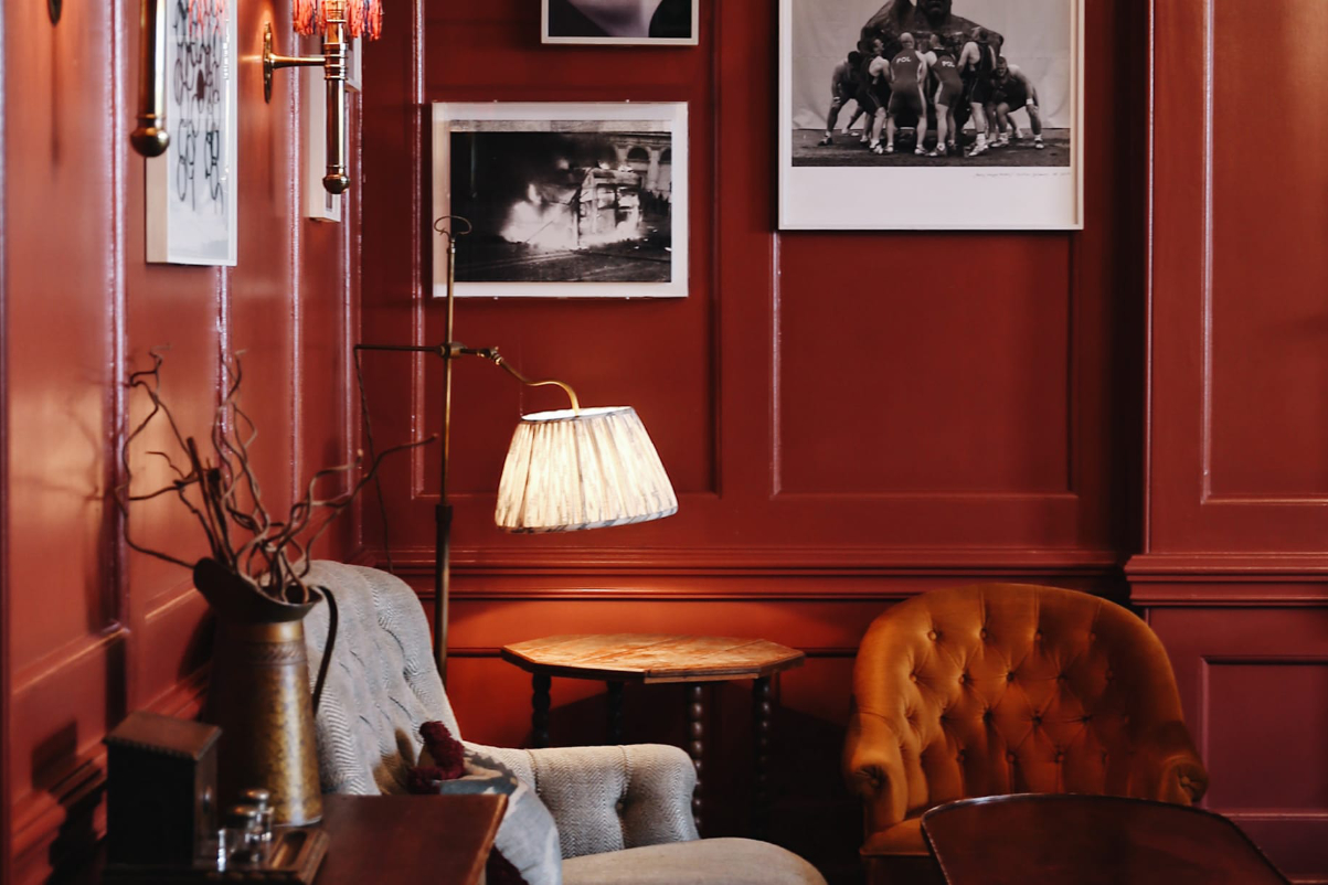 a view of a cozy nook with soft chairs at a member's club in london Soho House 76 Dean Street london source soho house